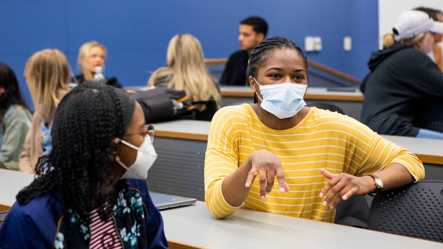 Students participate in class discussion