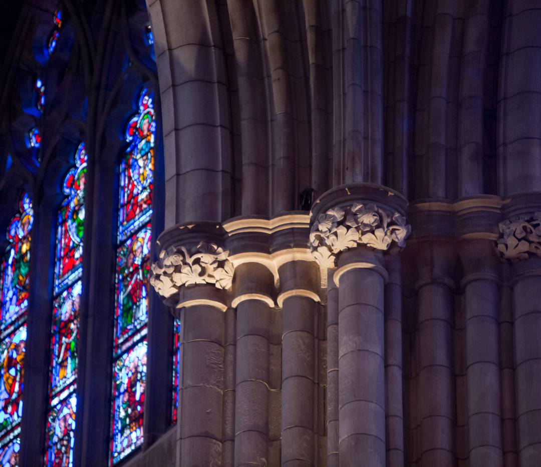 Stained glass window and pillar inside University Chapel