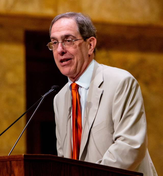 Christopher Eisgruber makes an address at the podium