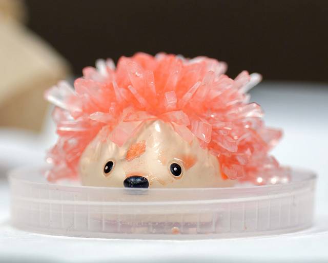 A miniature hedgehog with crystals for fur.
