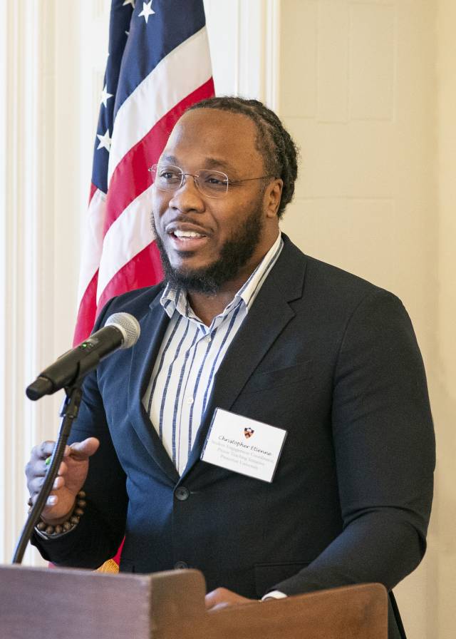 Christopher Etienne presenting at the PTI event